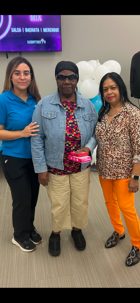 Banatty Foundation team members with a community elder at an event